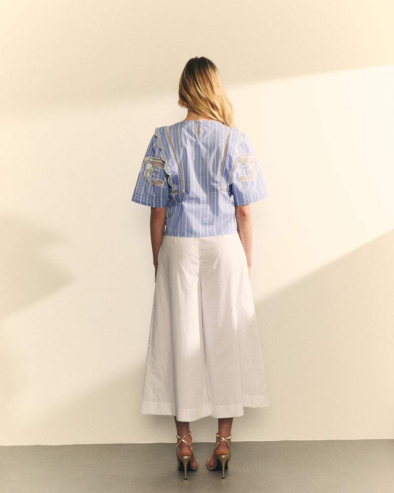 BLUSA CON RAYA Y ENTREDOS