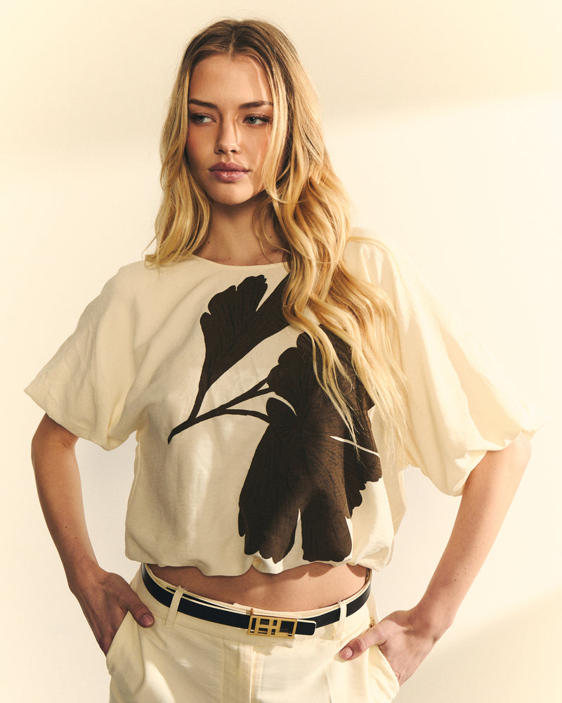 BLUSA ESTAMPADA CON MANGA ABULLONADA