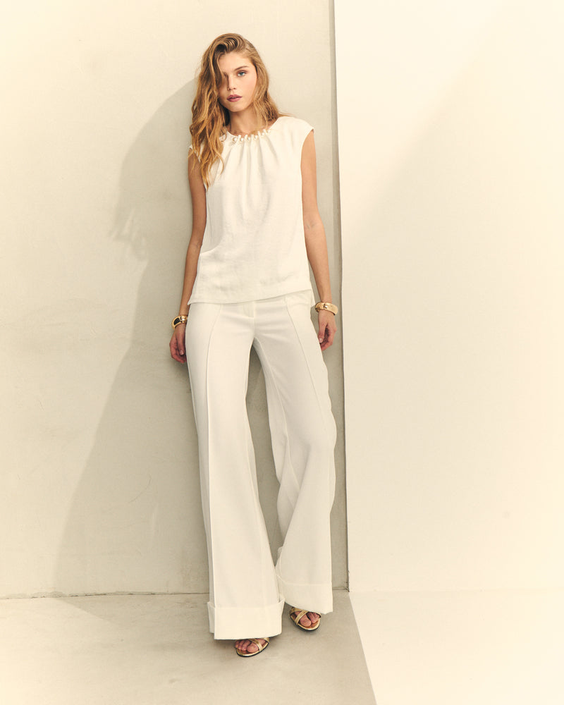 BLUSA SIN MANGAS CON PERLAS