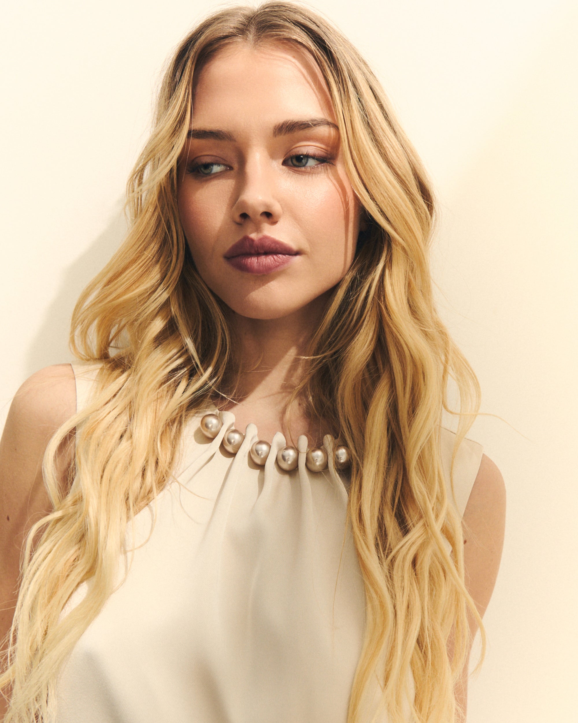 BLUSA LATERAL LARGO CON PERLAS