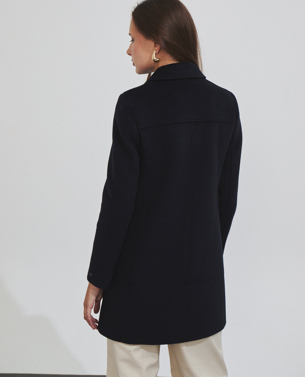 Abrigo midi de mujer cruzado con bolsillos de tapeta