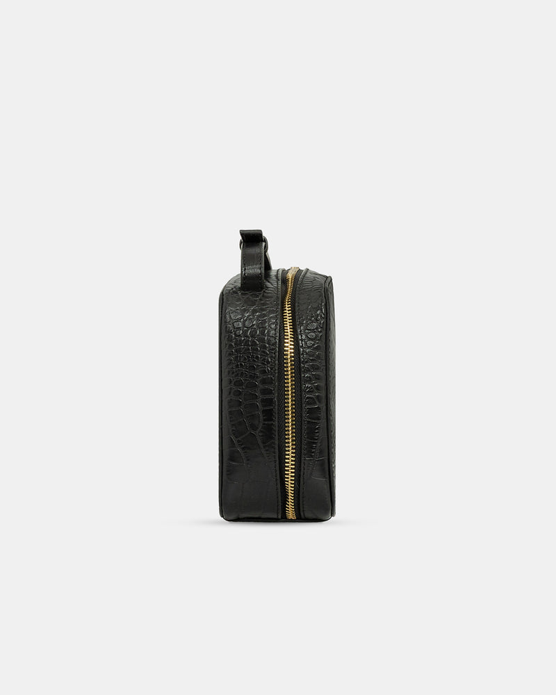 Bolso pequeño de piel con asa larga