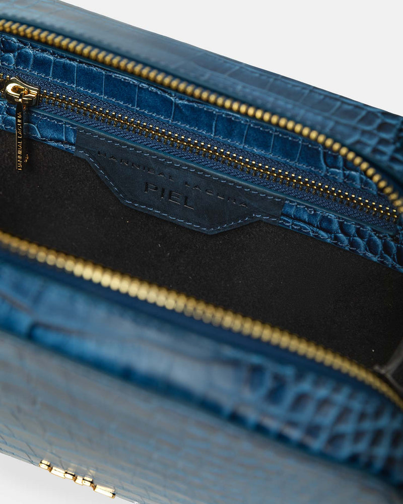 Bolso pequeño de piel con asa larga
