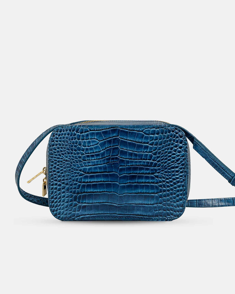 Bolso pequeño de piel con asa larga