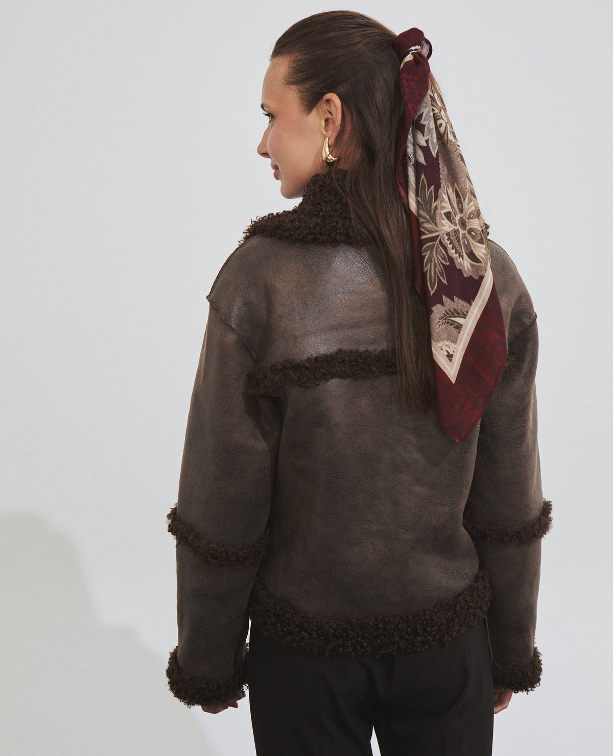 Veste courte réversible effet fourrure avec poches plaquées