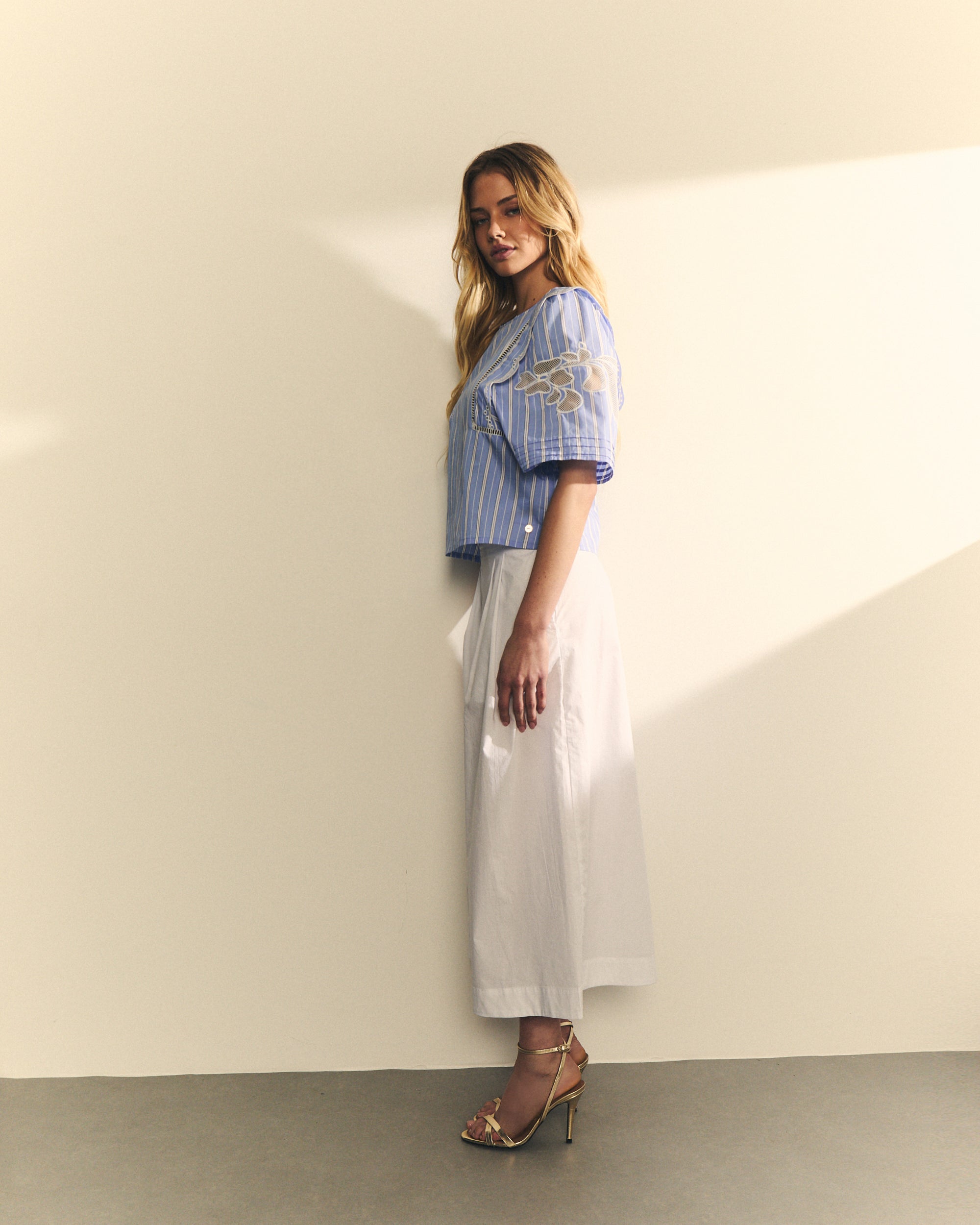 BLUSA COM LISTRA E ENTREMEIO