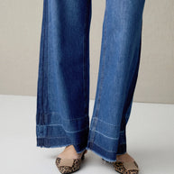 PANTALON DENIM FLUIDO CORTES BAJO