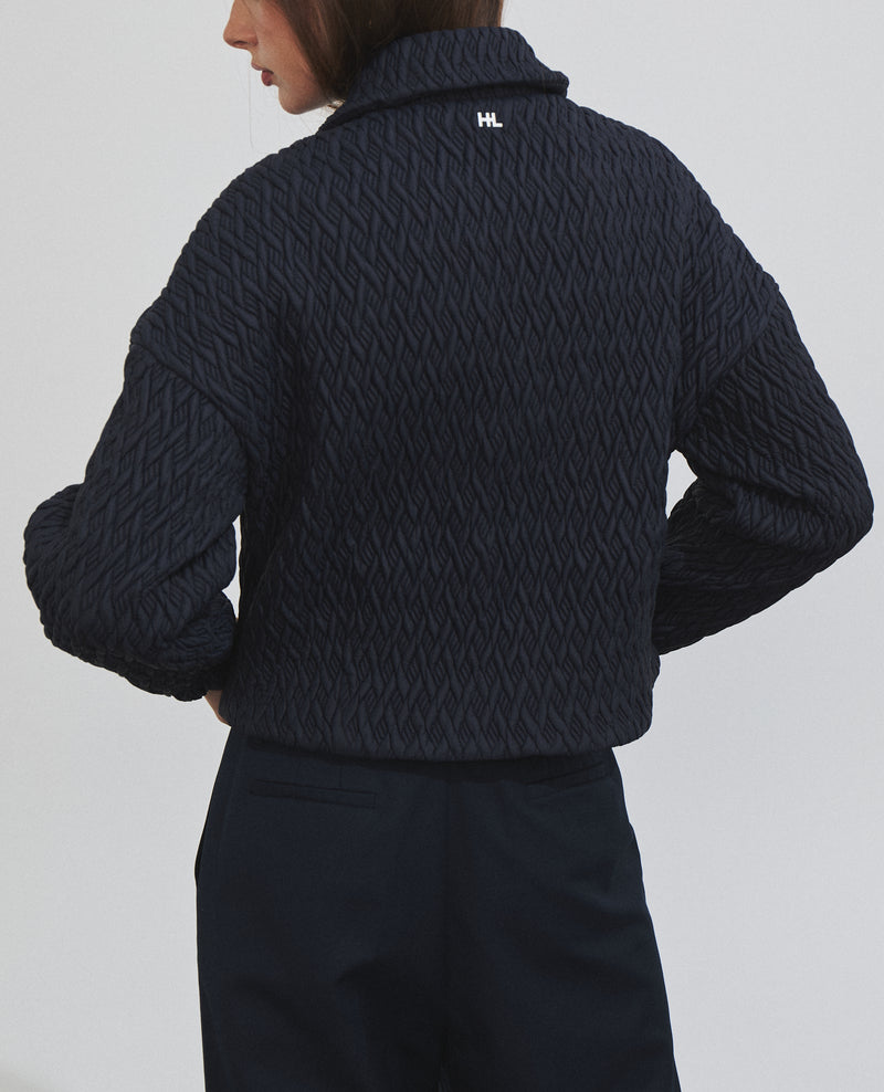 Chaqueta acolchada corta de mujer con tejido acolchado geométrico
