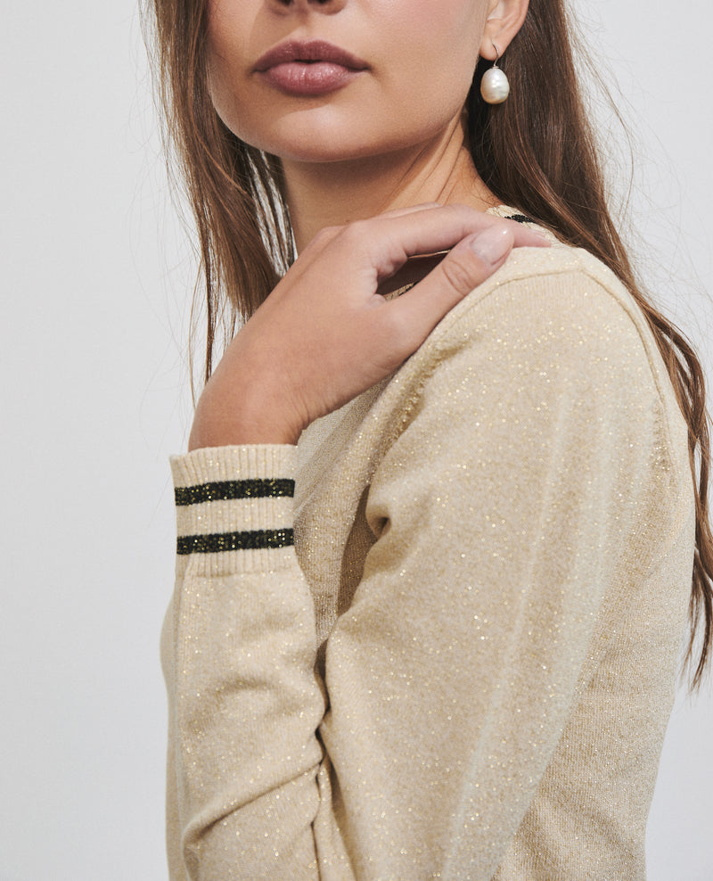 Top de mujer de punto metalizado con detalles a contraste