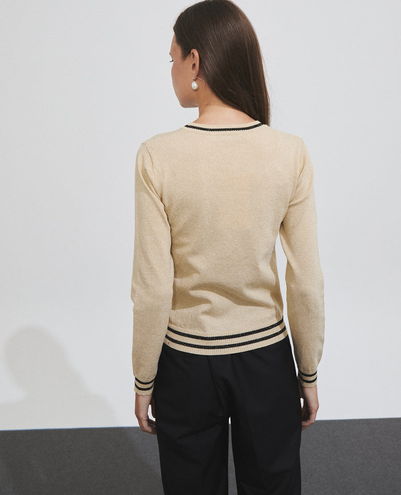 Top de mujer de punto metalizado con detalles a contraste