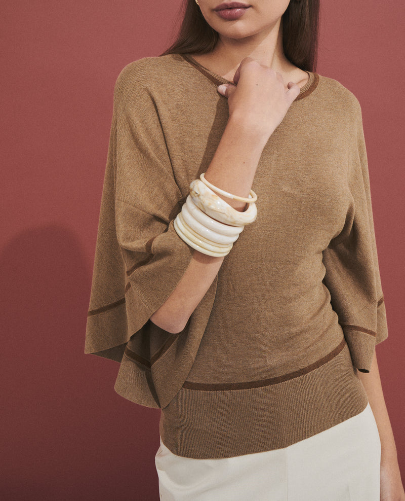 Jersey de mujer estilo capa