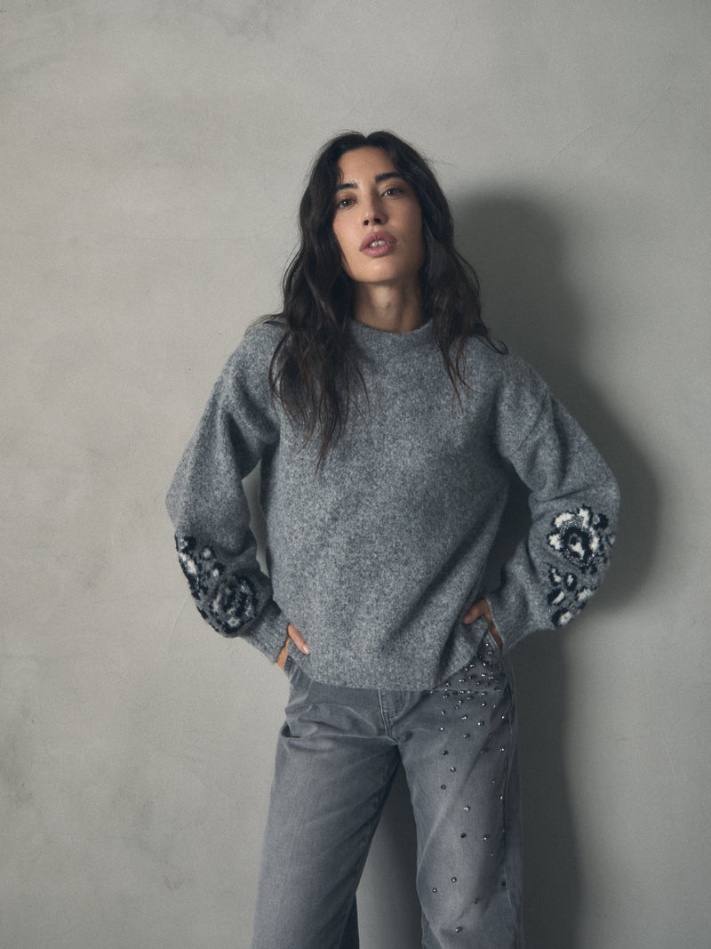 JERSEY CUELLO PERKINS DETALLE DE FLORES