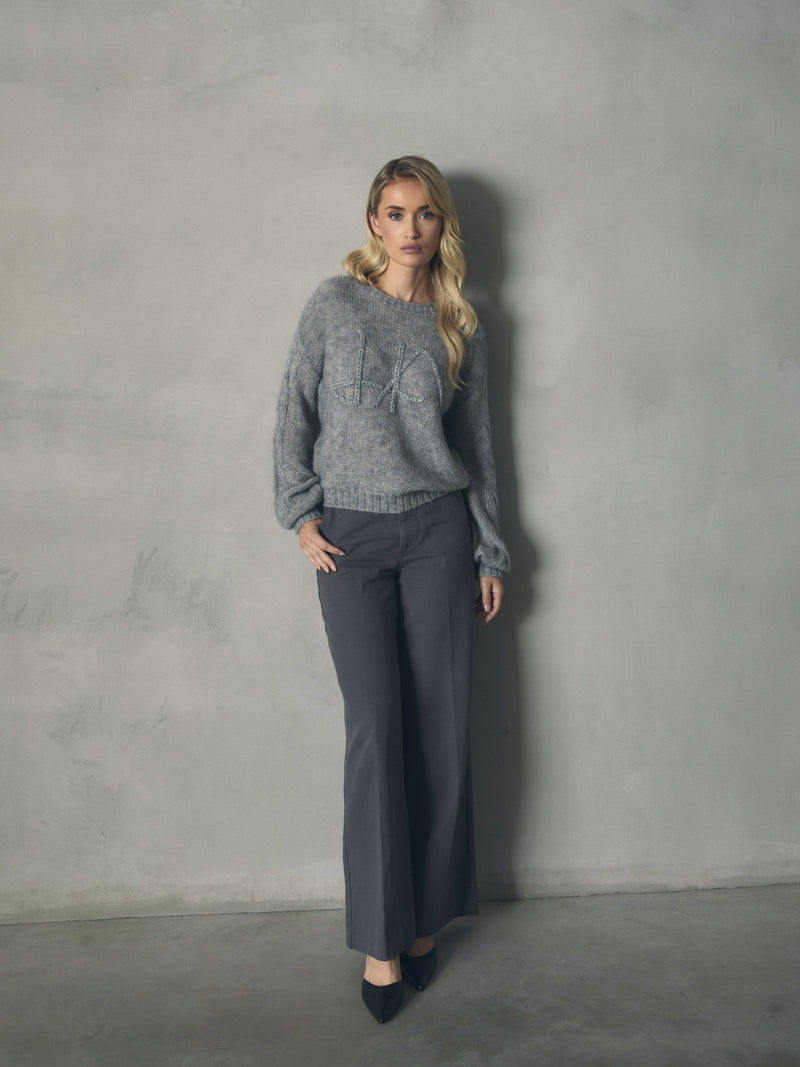 JERSEY  MOHAIR MANGAS ABULLONADAS